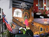 Ecuador Quito 02-10 Cafe Cultura We tried to stay at the Caf� Cultura, but it was booked. So, we went there for a delicious lunch. Here is the entranceway at the Caf� Cultura in the Mariscal sector of Quito, with a nicely painted staircase leading to the rooms. Different artists have painted modern frescoes throughout the hotel, including the bathroom and the dining room.